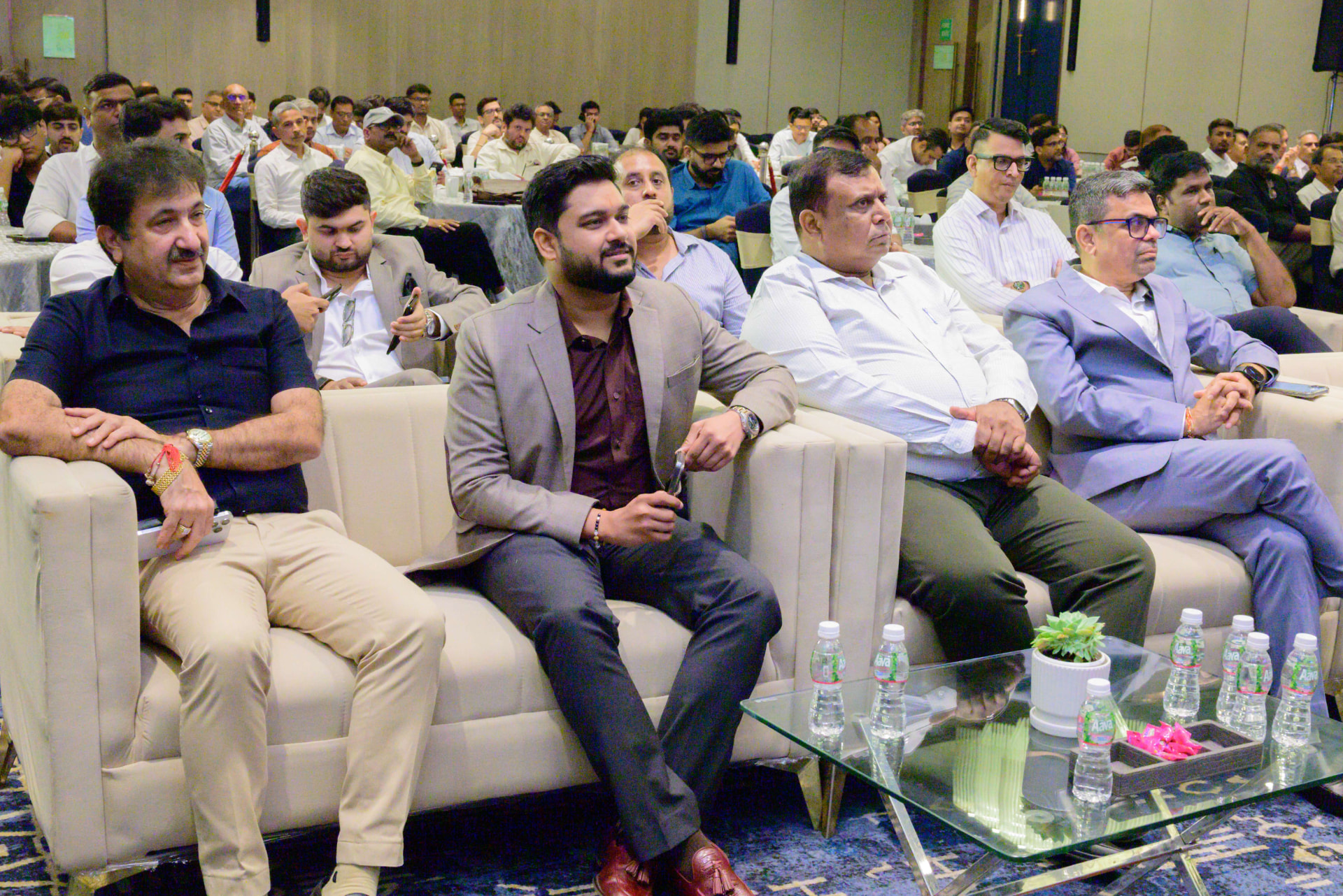 Lakshit Sethiya seated with attendees at the CREDAI BANM event