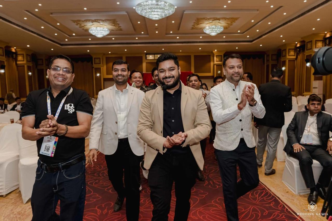 Lakshit Sethiya with attendees at a professional event