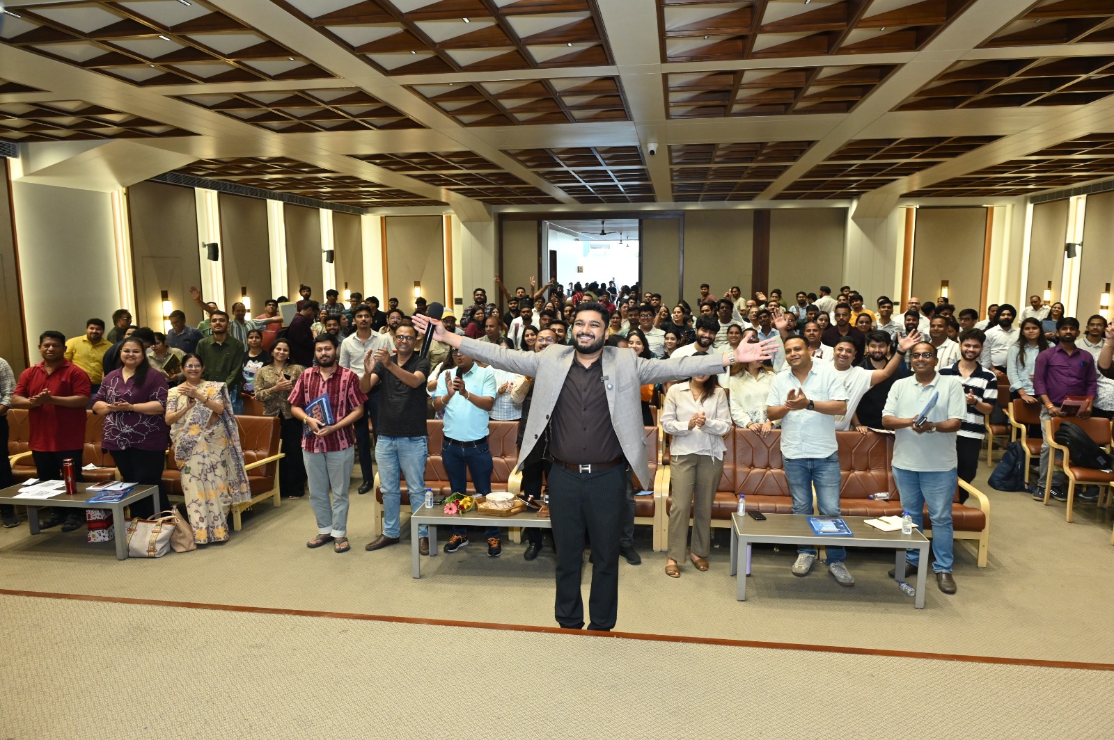 Lakshit Sethiya receiving a standing ovation from the seminar audience